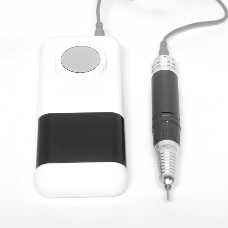 Белая портативная электрическая дрель для ногтей